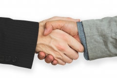 Business handshake agreement.  Power of financial contract and agreement to join and work together.