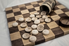Business competition chess board concept in grainy faded old time look.  Copyspace for text.